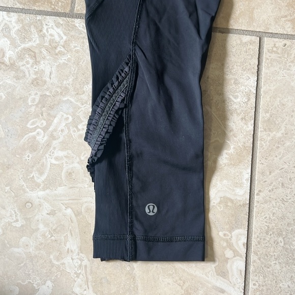 Lululemon black crop legging with ruffle detail. - Picture 3 of 4